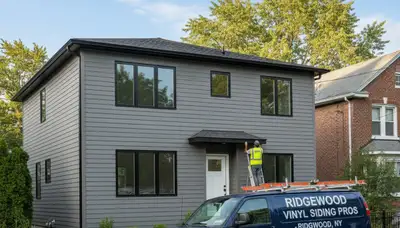 Professional vinyl siding installation on Brooklyn NY home exterior by sidingbrooklynny.com